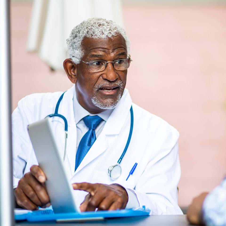 Dr. Titus Sserubiri